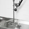 T&S Brass And Bronze Works Equip By T&S 5PR-8W12-C Wall Mounted 35 11/16" High Pre-Rinse Faucet With 8" Adjustable Centers, 1.2 GPM Spray Valve, 44" Hose, 12" Add-On Faucet, And 6" Wall Bracket